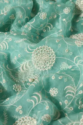 Exclusive Gold Matte Sequins With White Thread Floral Embroidery On Teal Organza Fabric